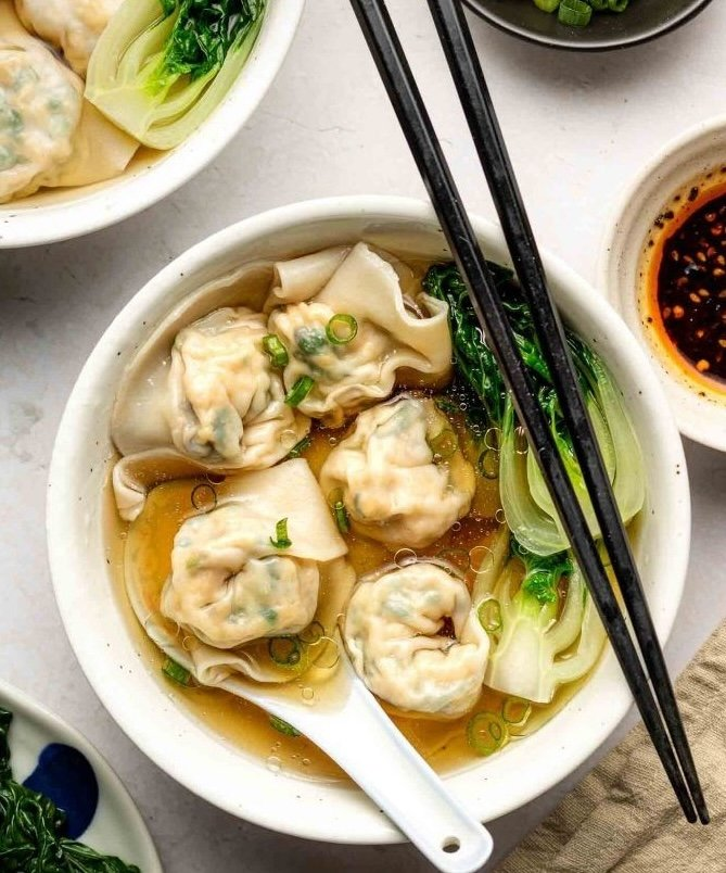 Wonton Soup at Wrap N Roll Saskatoon — warming Vietnamese wonton soup with shrimp, chicken broth, broccoli, carrot, cabbage and sesame oil